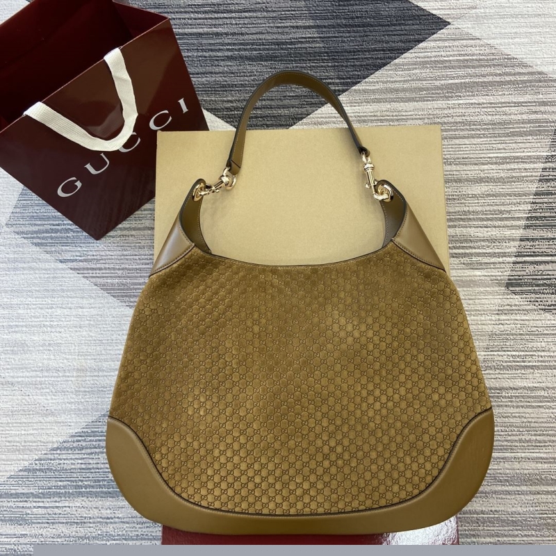 G*u*i top handle bags